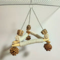 A large bird swing with a cage for chewing toys, 3 bird pads wrapped in sisal, and a stable triangular design, a wooden hanging toy swing (small)