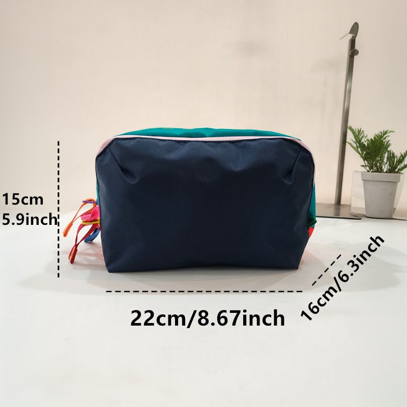 Dopamine Color-Blocking Cosmetic Bag, waterproof with large capacity, layered storage for skincare and makeup, easy opening and closing with drawstring zipper, essential sweet storage item for travel and commuting./(front) black (back) sky blue